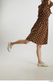 Aera  1 brown dots dress casual dressed flexing leg…